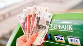 Сколько можно снять денег в терминале Сбербанка в Фамилия